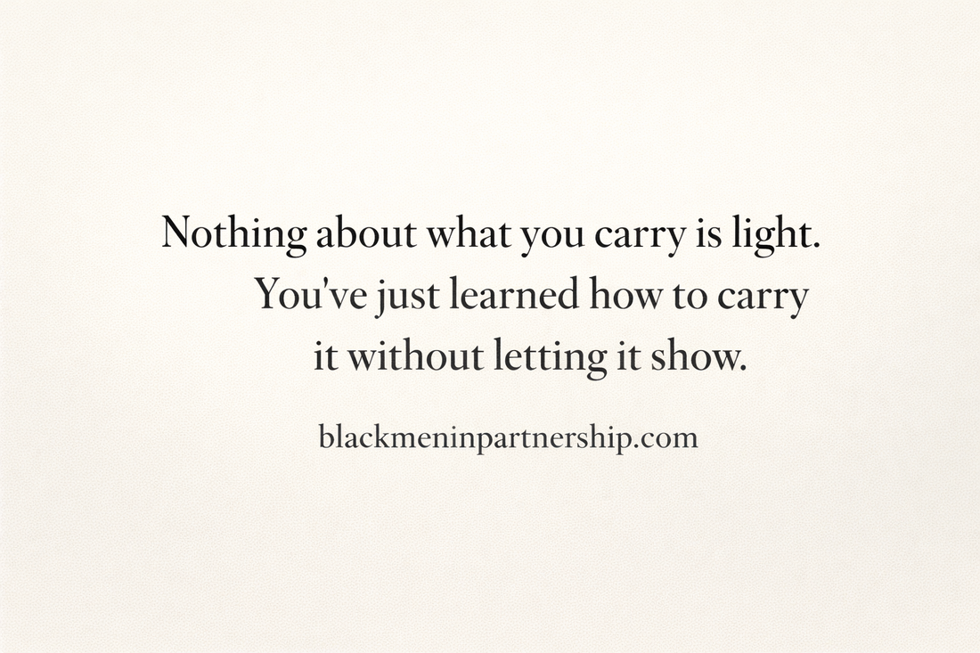 Elegant banner with quote about emotional weight and silent responsibility, highlighting how Black men carry pressure without showing it