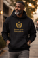 Urban lifestyle photo of Black man wearing navy hoodie with gold integrity statement